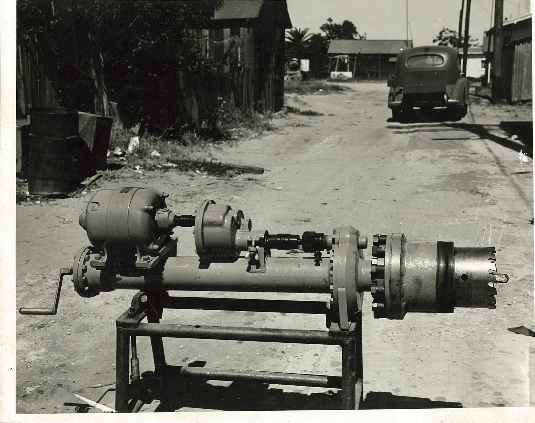 Early Koppl hot tap machine mounted on a metal stand