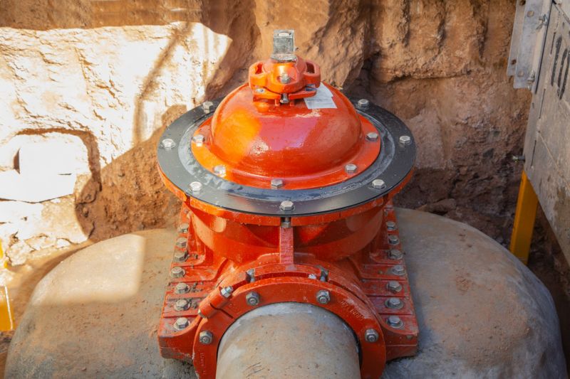 Mueller insertion valve installed on a water main in a shored trench