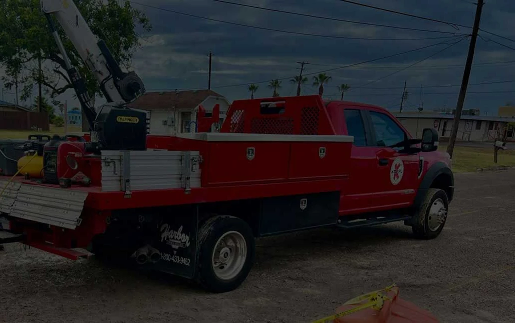 Koppl service truck beside pipeline equipment